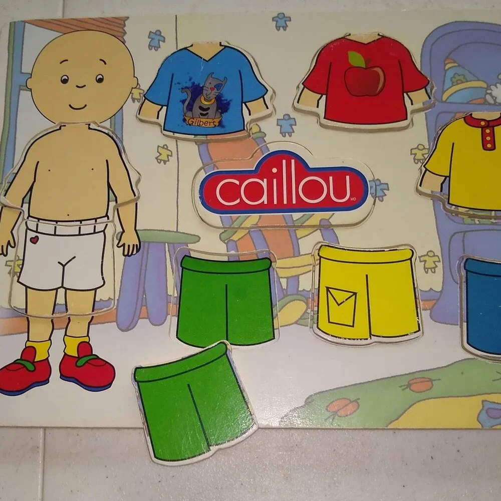 Wooden puzzle Caillou : Dress up + Pique -nique used